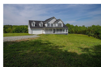 Building Photo - 4-Bedroom Home on 12 Acres with 2 Car Atta...