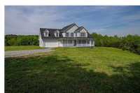 Building Photo - 4-Bedroom Home on 12 Acres with 2 Car Atta...