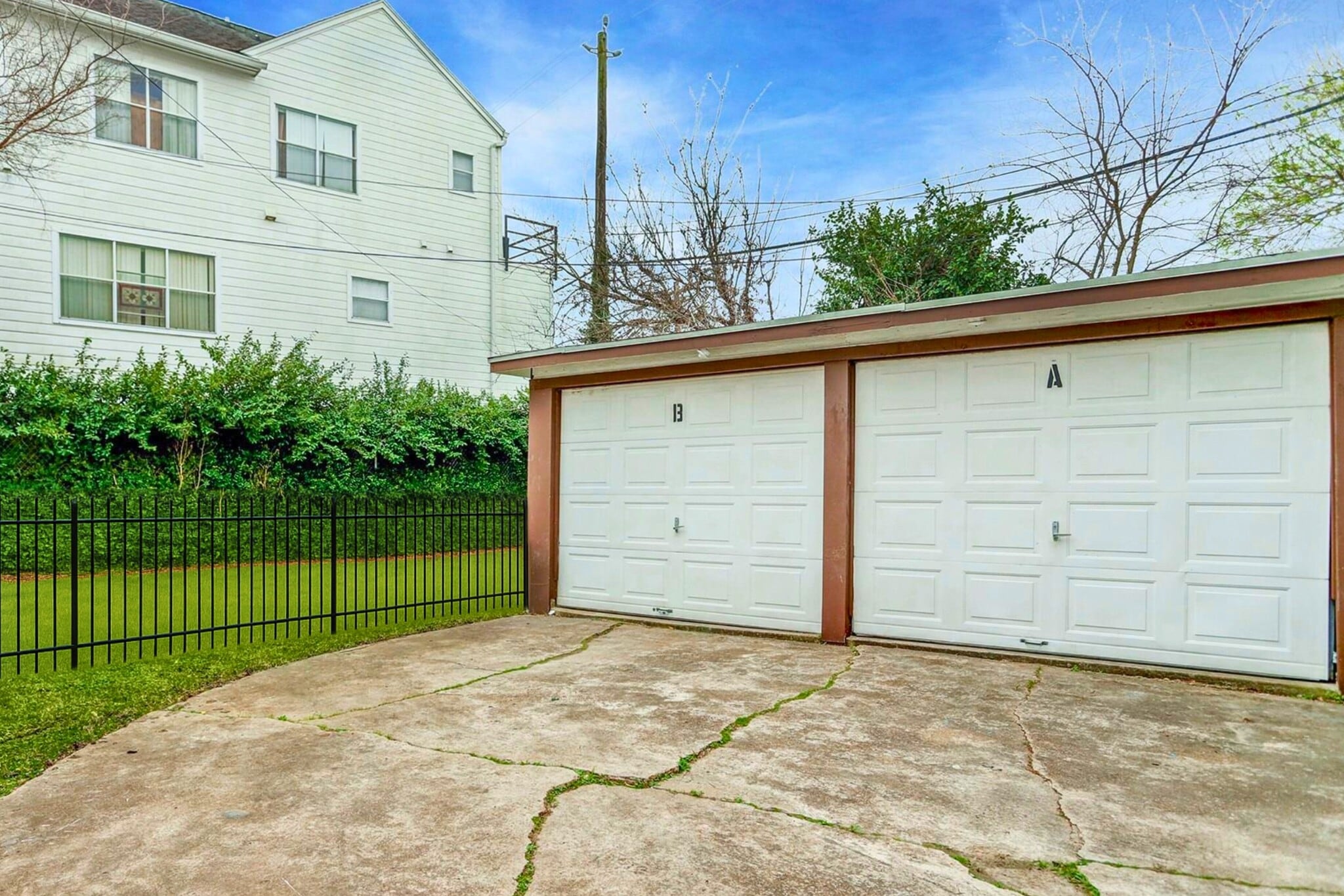 Coveted side by side parking is enjoyed in front of each garage. - 3911 Law St