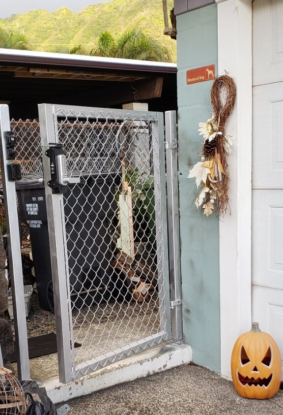 Locked gate - 3337 Pakanu St