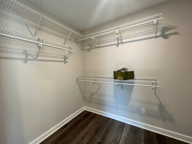 Building Photo - Three bedroom three bath available now!