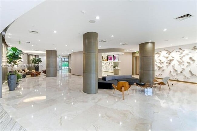 Building Photo - 10275 Collins Ave