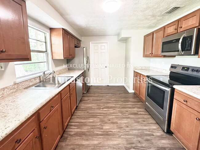 Building Photo - 4516 Key Woodley Dr S