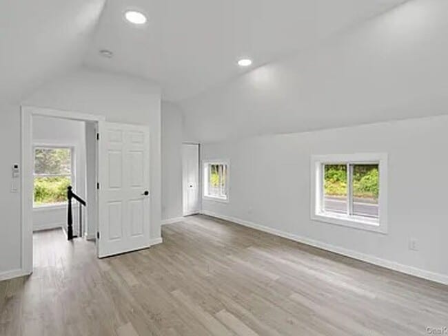 Building Photo - Fully Renovated 3BR Retreat on Highland La...
