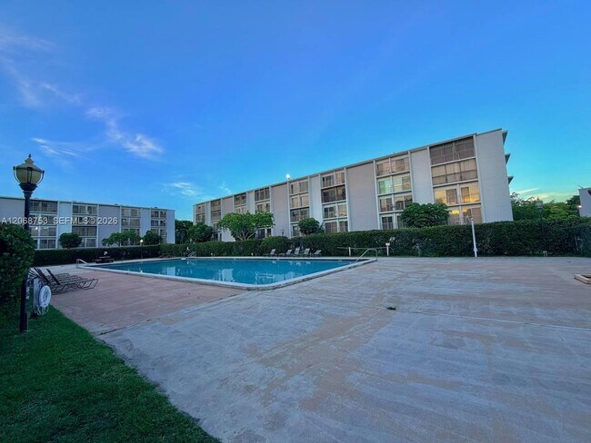 Building Photo - 8750 N Sherman Cir