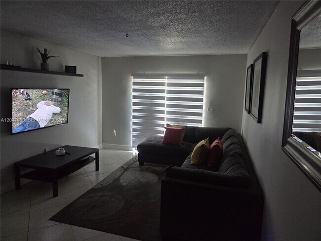 Building Photo - 4265 NW S Tamiami Canal Dr