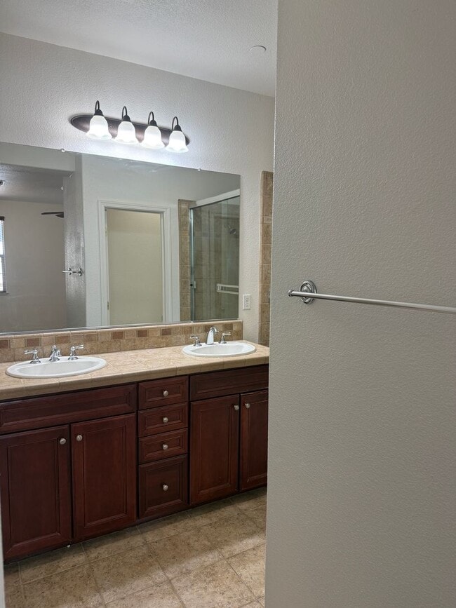 Building Photo - NICE 2-STORY CONDO 3 BED, 2.5 BATH, & 2 CAR GARAGE NEAR SHOPPING & HWY 50!