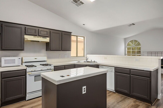 Building Photo - "Charming 3-Bedroom Oasis on Akamine Ave – Spacious 1702 Sq. Ft. with 2 Full Baths!"