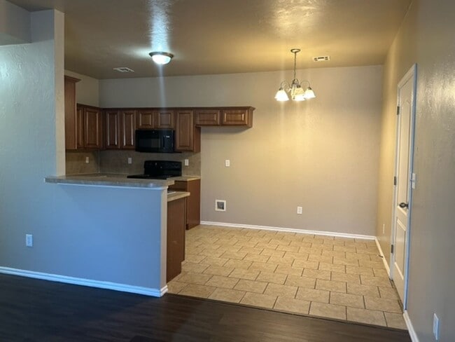 Building Photo - Great Duplex with Open Floor Plan - Wood Laminate Floors in Living