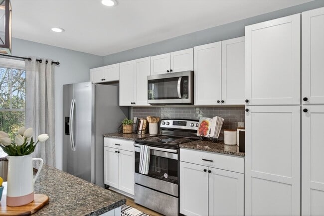 Building Photo - Move-In Ready: Upgraded 3-Bedroom Townhome at Swallow Ridge!  This is a must see!