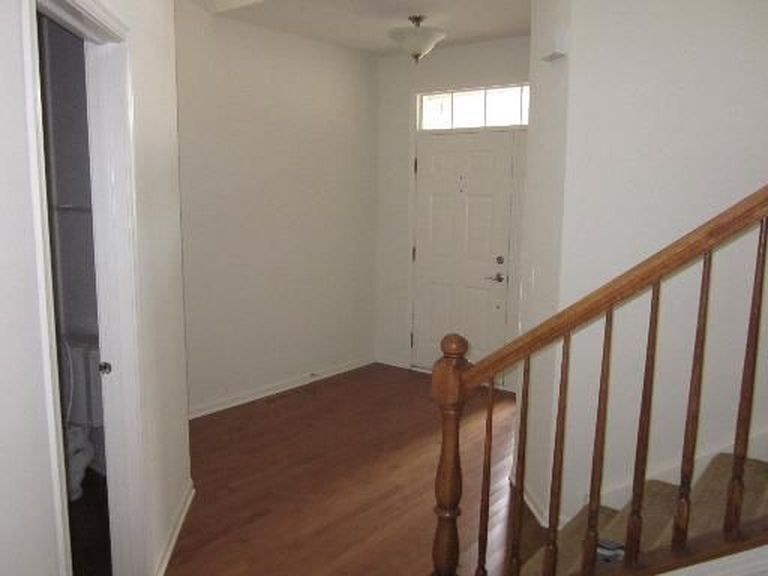 entryway with coat closet - 281 Hickory Lane