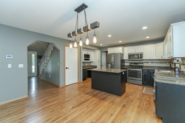 Building Photo - Spacious Home With Finished Basement And 3 Car Garage