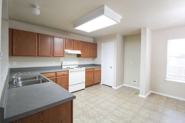 Building Photo - 16130 Branching Oaks