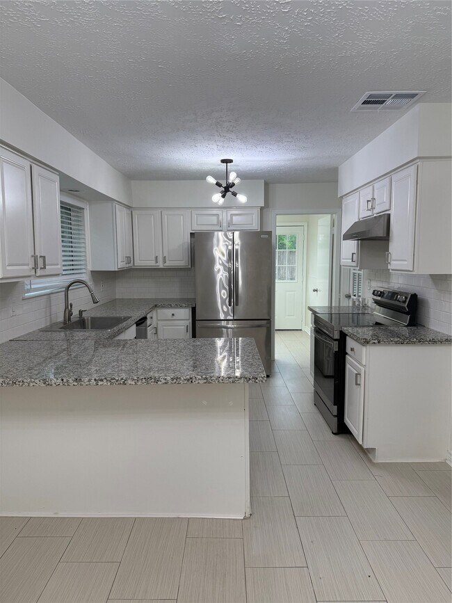 Building Photo - 2318 Aprilmont Dr