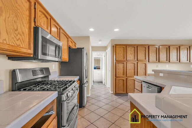 Building Photo - 5-Bedroom Residence Ready for Immediate Move-In