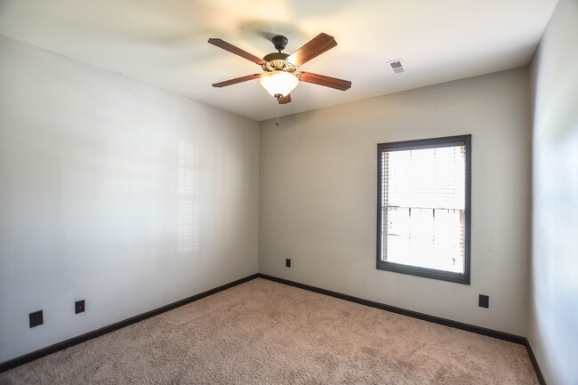 Building Photo - Pet Friendly Three Bedroom with Bonus!