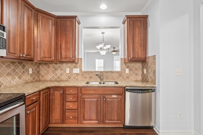Building Photo - Charming Full-Brick Townhome in the Heart of South End