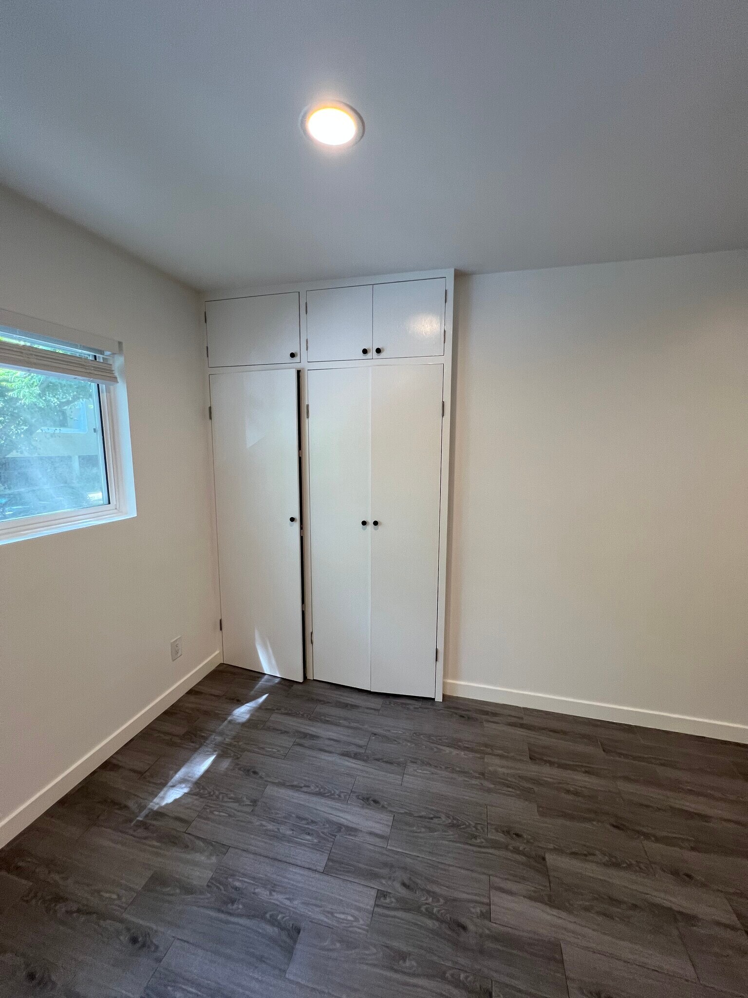 Washer and dryer on right hand side storage on left-hand side - 1330 N Sweetzer Ave