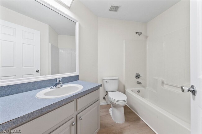 Building Photo - 4BR Home in Gated Town Lakes Community with Lake View