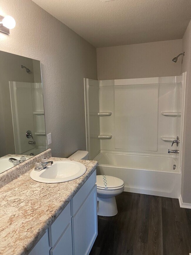 Building Photo - NOW AVAILABLE — Spacious Living in This 4-Bedroom | 2-Bath Conrad Court Home