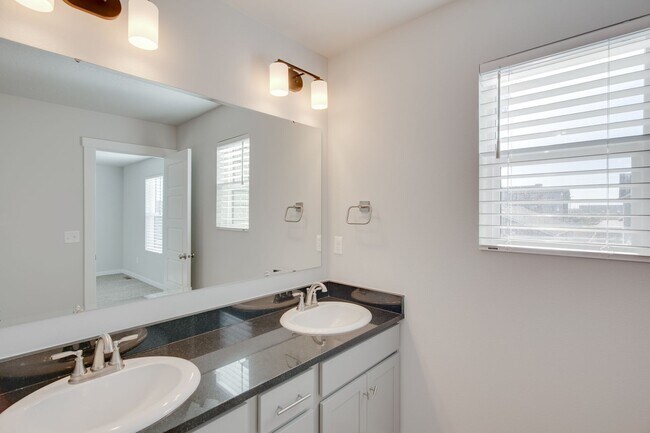 Building Photo - Baraya Townhomes: Modern Townhomes for Ren...