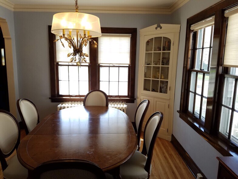 Dining room with built-in corner cabinet - 1347 W Highland Pkwy