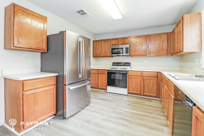 Building Photo - 8003 Mosstree Dr