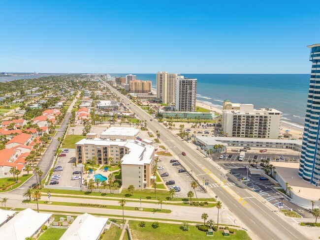 Building Photo - Wake Up to the Ocean Breeze – Your Beachsi...