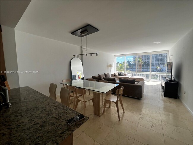 Building Photo - 10275 Collins Ave