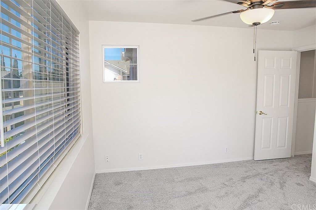 Bedroom 3 is 10' x 11' 3" with new ceiling fan and new carpet - 3051 Augusta St