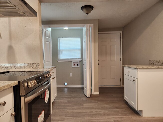 Kitchen, laundry, back door - 202 N Getzendaner St