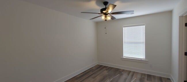 Building Photo - 5-bedroom home with 3 car garage and fully...