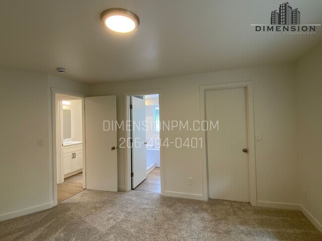 Building Photo - Stylishly Renovated Home with Private Back...
