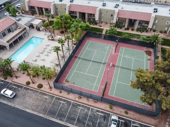 Building Photo - Guard gated SW community with easy Strip a...