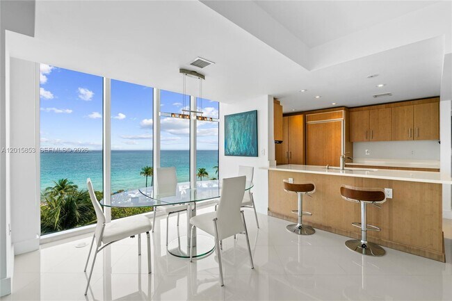 Building Photo - 10275 Collins Ave