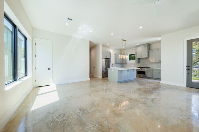 Building Photo - Luxury Redefined: Experience Vibrant Living in this 3-Bedroom Haven in East Austin