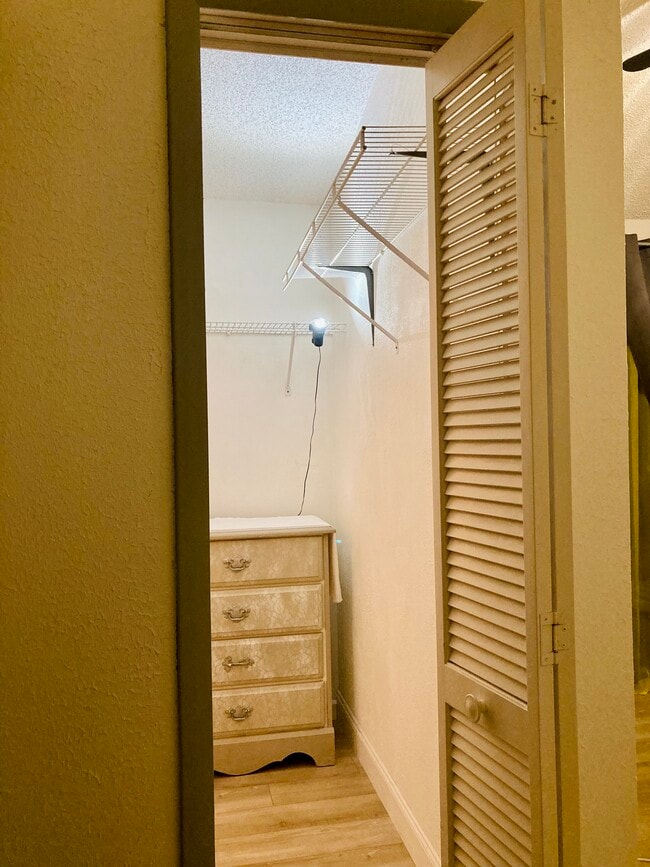 There is a wireless switch that turns on additional closet lights - 1711 Hammock Pine Blvd