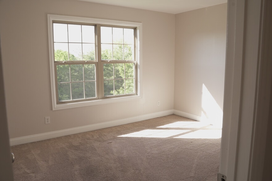 Second Story Right Bedroom #3 Overlooking the Woods and Green Space with Large Closet (11x13) - 393 Hays Blvd