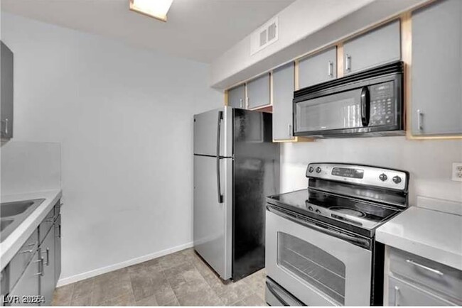 Building Photo - 2300 E Silverado Ranch Blvd