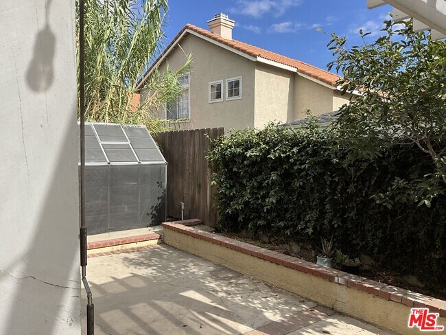 Building Photo - 8087 Tuscany St