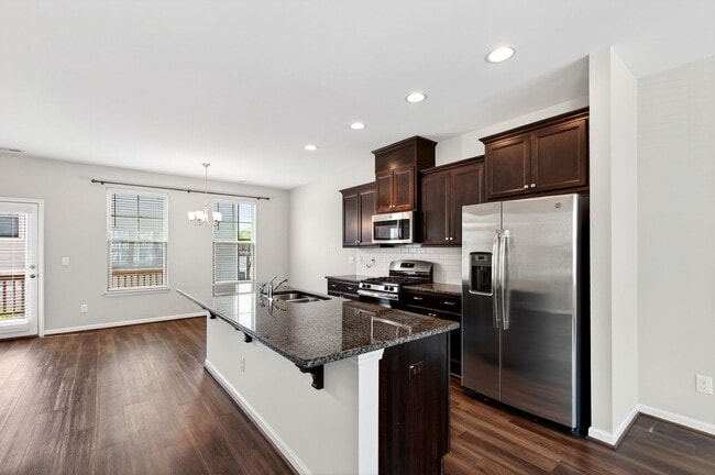 Building Photo - ***Pending*** Beautiful 4BR End-Unit Townhome in Prime Apex Location!