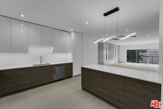 Building Photo - 10630 Wilkins Ave