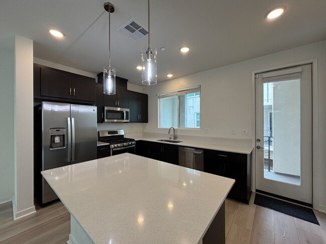 Building Photo - Beautiful 3BD/2.5BA Townhouse in San Ysidro W/ W/D, A/C, 2-Car Garage, Balcony, and Community Parks!