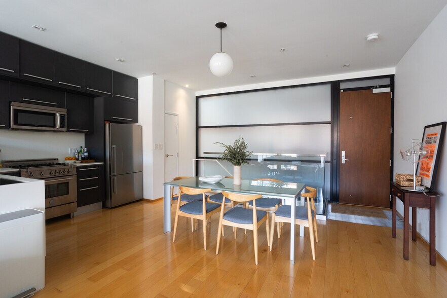 Open concept dining and kitchen area. - 2250 11th St NW