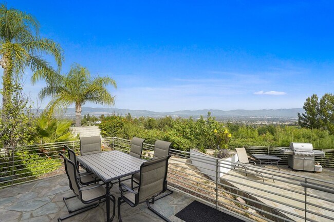 Building Photo - This stunning 5 Bed / 3 Bath Home South of Ventura Boulevard with pool and panoramic views is now...