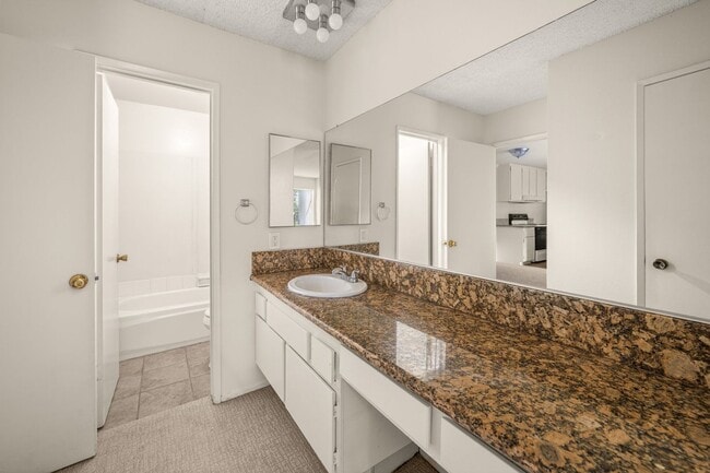 Building Photo - Upgraded Condo with Two Master Suites!!!