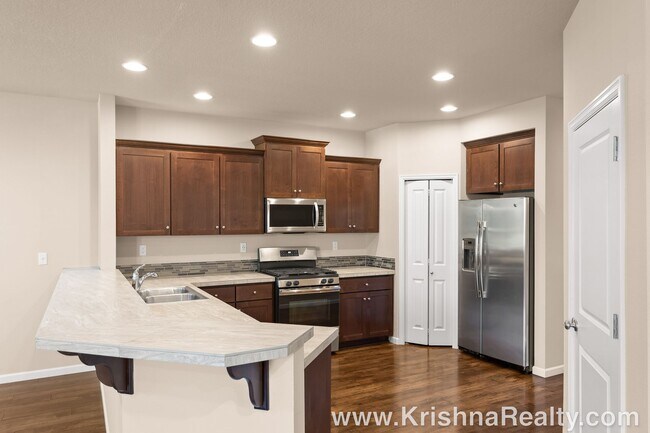 Building Photo - Lovely 4 BD | 2.5 BA | + Tech Niche | Single-Family Home | Coveted Abbey Creek | North Bethany | ...
