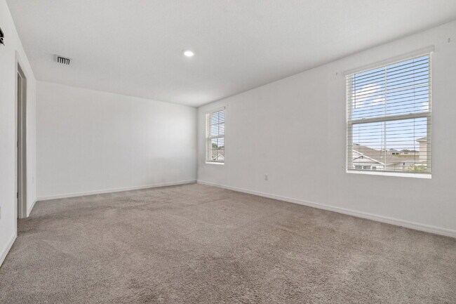 Building Photo - "Spacious 5-Bedroom Haven with Stunning Lake Views & Granite Elegance in Riverview!"