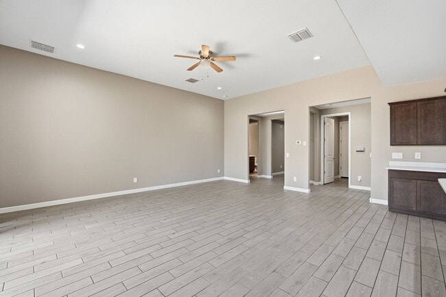 Building Photo - Spacious 5-Bedroom Home with Open Floor Plan & Private Backyard