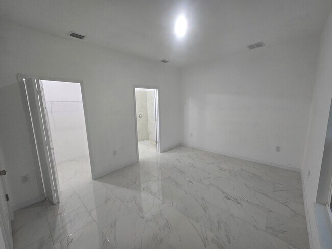Building Photo - BRAND NEW THREE BEDROOM, 2 BATH, 1 CAR GAR...